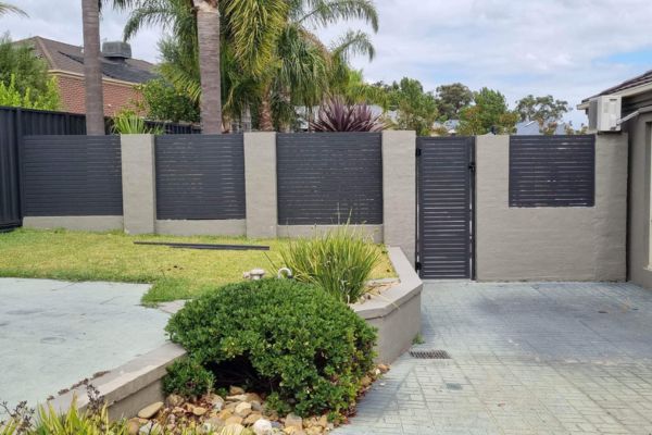 front fence with concrete and aluminium slats